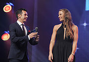 Moderator Jann Billetter in conversation with Ski Olympian Tina Maze at the Internationale Sportnacht Davos (3 October 2014)