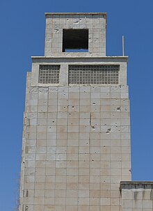 Bullet holes from 1958 at Jafariya 1958bulletholes-Jafariya-School-Tower-TyreSour-RomanDeckert07082019.jpg