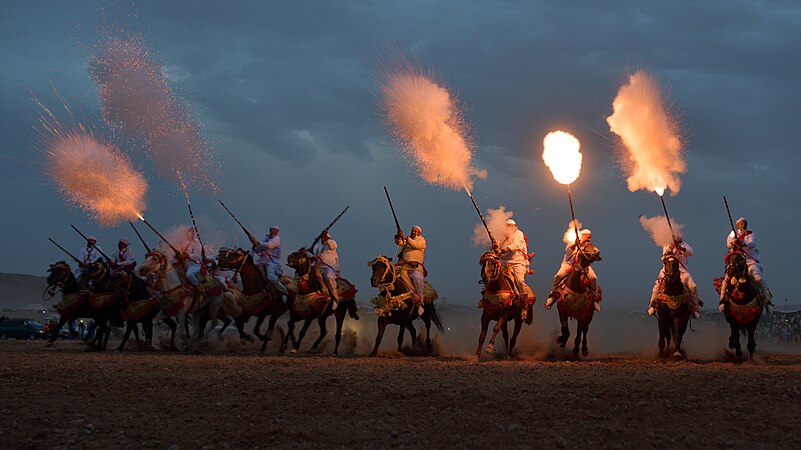 Gunpowder celebration during a traditional season in Morocco by Houssain tork