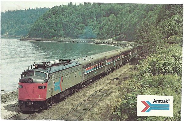 An EMD E8 on the Coast Starlight in 1974. Amtrak planned to replace its E-units with the SDP40F