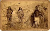 Apache warriors. In the center is Apache Kid (Haskay-bay-nay-ntayl)