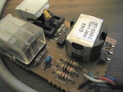 Rear view of auto-termination switch with dust cover removed