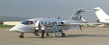 Avanti parked on tarmac.