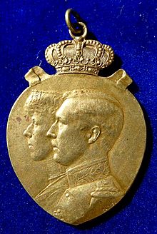 Portrait von Albert & Elisabeth 1924 auf der Vorderseite einer militärischen Medaille zur Ruhrbesetzung. (Quelle: Wikimedia)