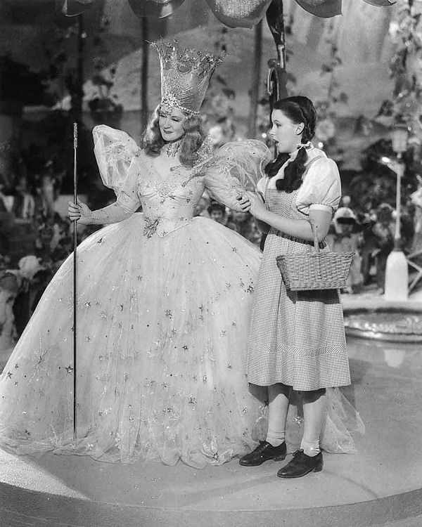 Dorothy (Judy Garland, right) with Glinda, the Good Witch of the North (Billie Burke) in The Wizard of Oz, 1939