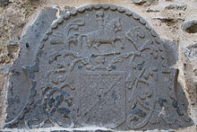 Relief of coat of arms of the FitzGerald of Desmond (showing the saltire) in Buttevant Friary Buttevant Friary South Transept South Gable FitzGerald of Desmond Coat of Arms Detail 2012 09 08.jpg