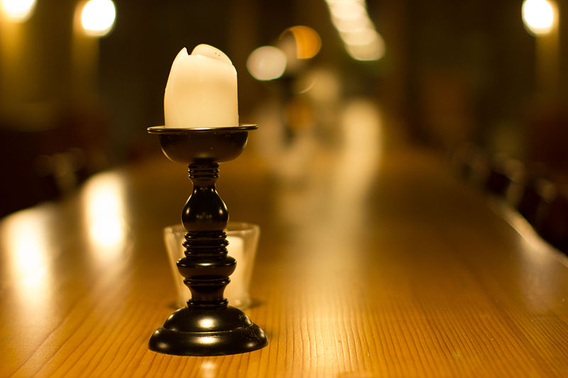 File:Candle on table in Wine cellar-9473.jpg