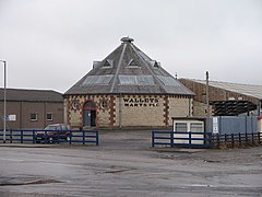 An octagonal cattle market building