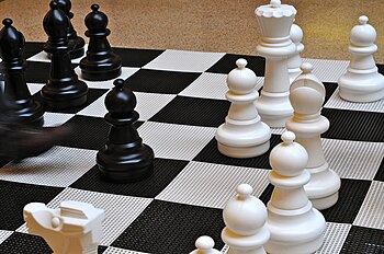 English: A large chess game inside Enoch Pratt...