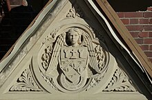 The crest of Canterbury College over the main entrance Christchurch Girls' High School, Canterbury College crest.jpg