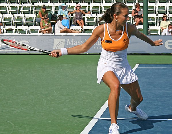 Corina Morariu hitting a forehand