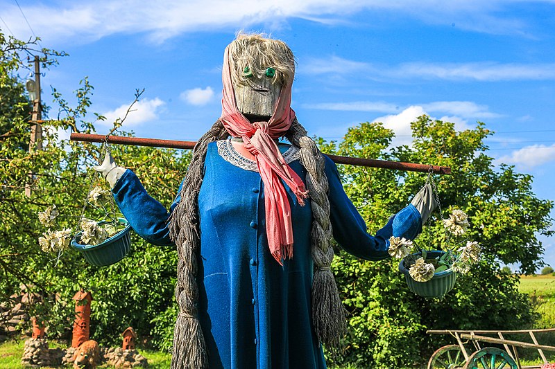 File:Country dolls in Belarus. Woman with rocker.jpg