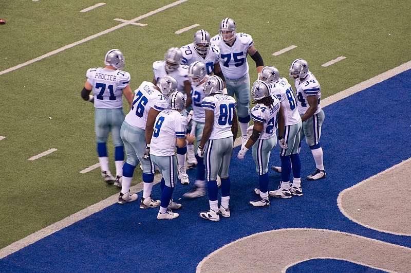 File:Cowboys huddle.jpeg