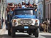 Riding in the back of a truck in Cuba