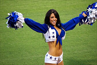 The Dallas Cowboys Cheerleaders performing at Arvest Ballpark