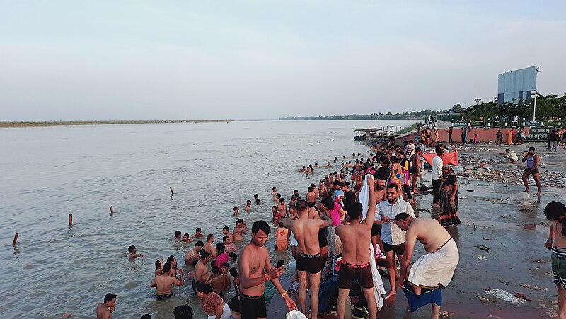 File:Devotees taking a bath in holy river, Ganga, at the Hindu festival of Guru Purnima.jpg