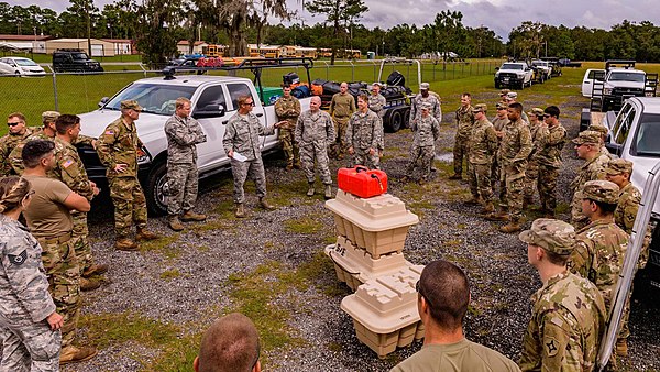 Members of the Florida National Guard convening near Starke, Florida, on October 9