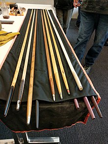 Full-size snow snakes at Ganondagan State Historic Site GanondaganWinterGames2019LongSnowSnakes.jpg