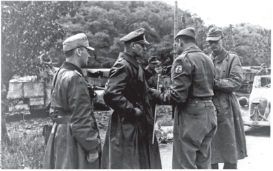 German Colonel Kleiber in preliminary talks with Brazilian Major Franco Ferreira about the surrender of the 148th Infantry Division to the FEB, after the Battle of Collecchio, on April 29, 1945. General German Brazil.png