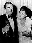 Gregory Peck and Sophia Loren during at the 35th Oscars (8 April 1963)