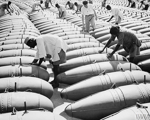 Workers check new fuel tanks during World War II