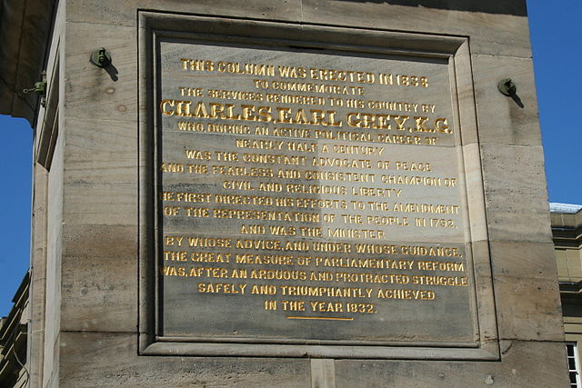 The base of the monument contains an inscription commemorating Earl Grey.