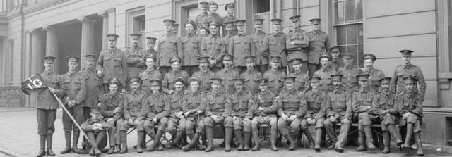 A platoon of the 1st Battalion, Irish Guards, pictured upon the outbreak of the First World War, 1914. Lieutenant Alexander is seated seventh from the