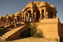 The song Kaatre En Vaasal was shot at Bada Bagh, Jaisalmer.