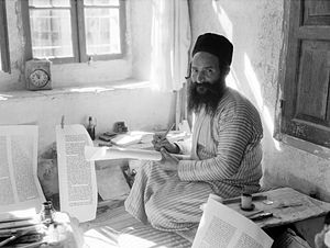 Jewish scribe writing the Torah.jpg