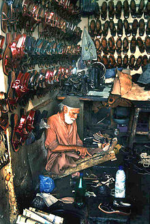 Traditional shoemakers still exist today, shoemaker in Karachi Karachi - Pakistan retouched.jpg