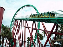 A train of the Kumba roller coaster ascending its lift hill