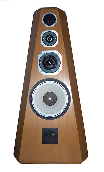 A four-way, high fidelity loudspeaker system. Each of the four drivers outputs a different frequency range; the fifth aperture at the bottom is a bass