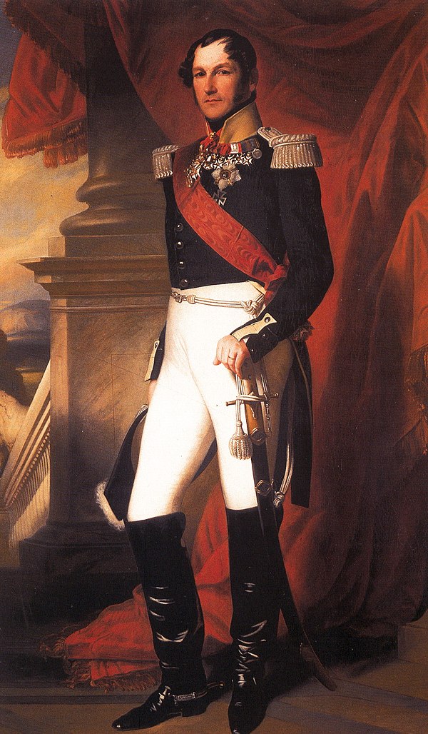 Article 85 of the Belgian Constitution vests the King's constitutional powers in the offspring of Leopold I.