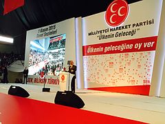 MHP leader Devlet Bahceli announcing his party's election manifesto on 3 October MHP 1 November 2015 election manifesto (2).jpg