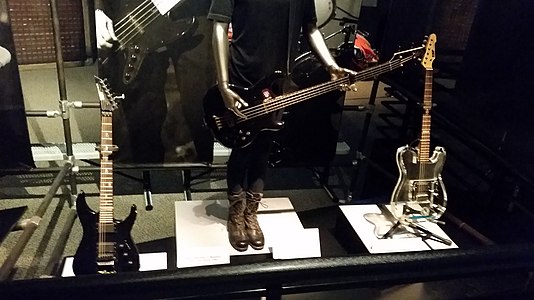 Metallica, Kirk Hammett's ESP guitar with vertical skulls & crossbones markers, Robert Trujillo's bass guitar & stage clothing, Kirk Hammets's ESP crystal Telecaster - Rock and Roll Hall of Fame (2014-07-12 15.58.57 by Zurich 99).jpg