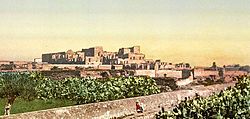 Photograph of the ruins of Mohamedia, Tunisia. This color photochrome print was made in 1899 in Tunis, Tunisia.