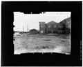 NORTH FACADE OF BAGGAGE BOON AND EAST PORTION OF NORTH FACADE OF STATION Copy photograph of photogrammetric plate LC-HAER-GS05-B-1977-1003R. - Baltimore and Ohio Railroad, Camden HAER MD,4-BALT,126-13.tif
