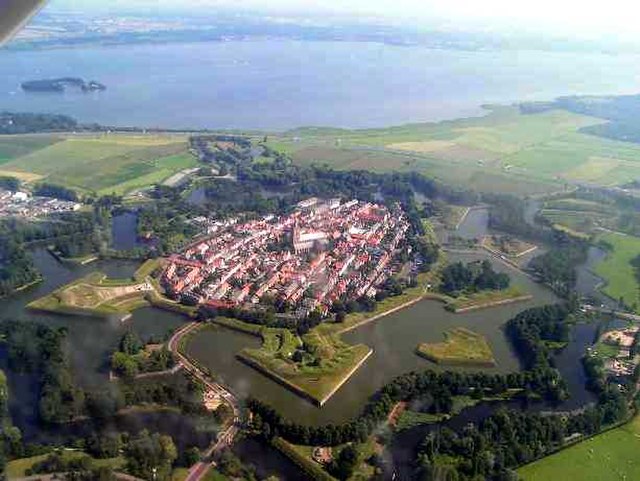 Aerial view of the fortified town of Naarden; with a good view of the star-shaped layout of the earth bastions, designed in the early gunpowder age to