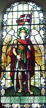 Stained glass window in the south wall depicting St. Michael in armour Newlands Church window.jpg