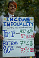 A protester with a sign at Occupy San Francisco on October 13, 2011