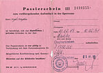 Pink slip of paper with the heading "Passierschein III zum vorübergehenden Aufenthalt in der Sperrzone"