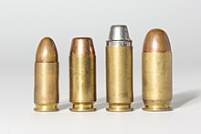 Left to right: 9x19 mm Parabellum, .40 S&W, 10 mm Auto, .45 ACP Pistol calibre cartridges comparison - 9x19mm Para, .40 S&W, 10mm Auto and .45 ACP.jpg