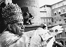Pope John XXIII's coronation on 4 November 1958. He was crowned wearing the 1877 Palatine Tiara. Pope John XXIII blessing the Crowd (1958).jpg