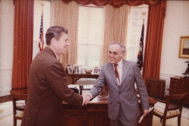 Novak greeting President Ronald Reagan in 1981