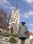 Saint Remigius’s Church (Cath.) with Sebastian Münster statue