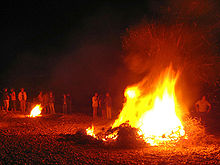 Bonfire at Almadrava beach on Saint John's night. Bonfires are very common in Spain and Portugal. Sant joan marina alta 2007.jpg