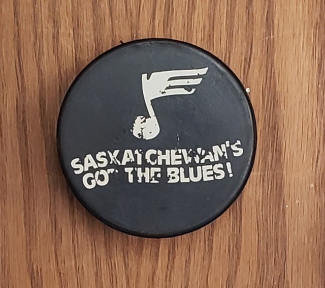"Saskatchewan's Got The Blues!" hockey puck circa 1983