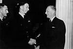 Thumbnail for File:Senator Roy Kendall greeting two Air Force officers.jpg