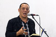 Sitok reading a poem from his collection Ereignis dan Cinta yang Keras Kepala, August 2015 Sitok Srengenge reading a poem, 2015-08-22 02.jpg