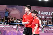 Deutsch: Tischtennis bei den Olympischen Jugendspielen 2018; Tag 9, 15. Oktober 2018; Mixed, Finale, Mixed-Doppel – Miu Hirano & Tomokazu Harimoto (JPN) gegen Sun Yingsha & Wang Chuqin (CHN) 1:3 English: Table tennis at the 2018 Summer Youth Olympics at 15 October 2018 – Mixed Final, Mixed-Double – Miu Hirano & Tomokazu Harimoto (JPN) Vs Sun Yingsha & Wang Chuqin (CHN) 1:3